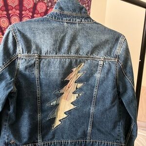 Cycled women’s jean jacket with cut out lightning bolt